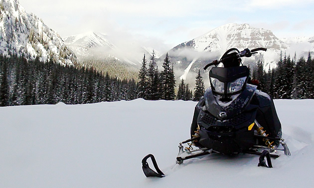 A snowmobile sits ready to ride in picturesque Elkford, BC. Photo courtesy David D'Andrea
