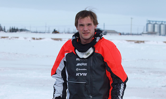 Travis MacDonald of MPH Racing posed for a photo with his Ski-Doo 440 race sled at the finals for last year’s Canadian Power Toboggan Championships. Darryl Gershman photo - CPTC