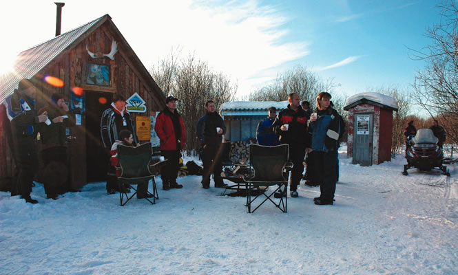 Barrhead sledders gather at one of the local club's warm-up shelters. photo courtesy Northern Lights Snowmobile Club