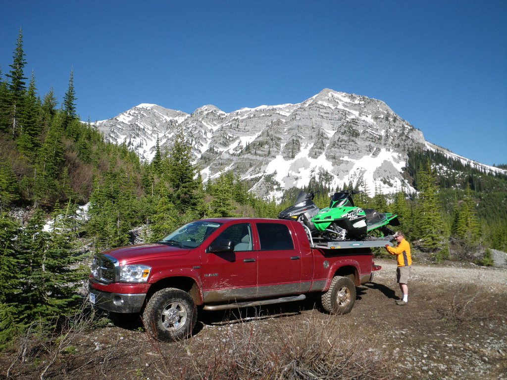 The group unload their sleds in the gorgeous Kootenay mountains. Photo courtesy Mel Dies