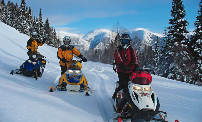 Snowmobiling in B.C. is all about mountains, valleys, forests, great trails and non-stop scenery—Mackenzie is a perfect example. photo courtesy Rocky Mountain Trench Adventures