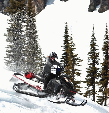 Tina Thomas believes that the best way to explore any area is by snowmobile. Photo courtesy Thunderstruck Films