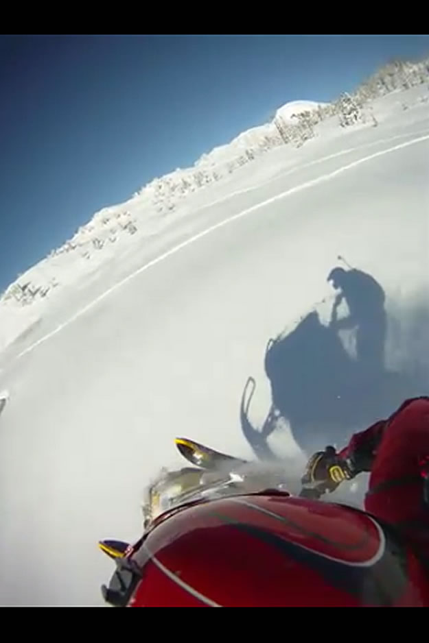 Photo of a snowmobilers shadow