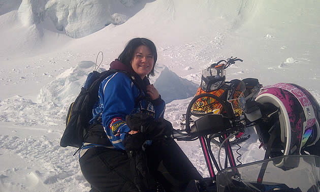 Krissy Woodland stops on Kakwa's flat-top area for a look at the glacier.